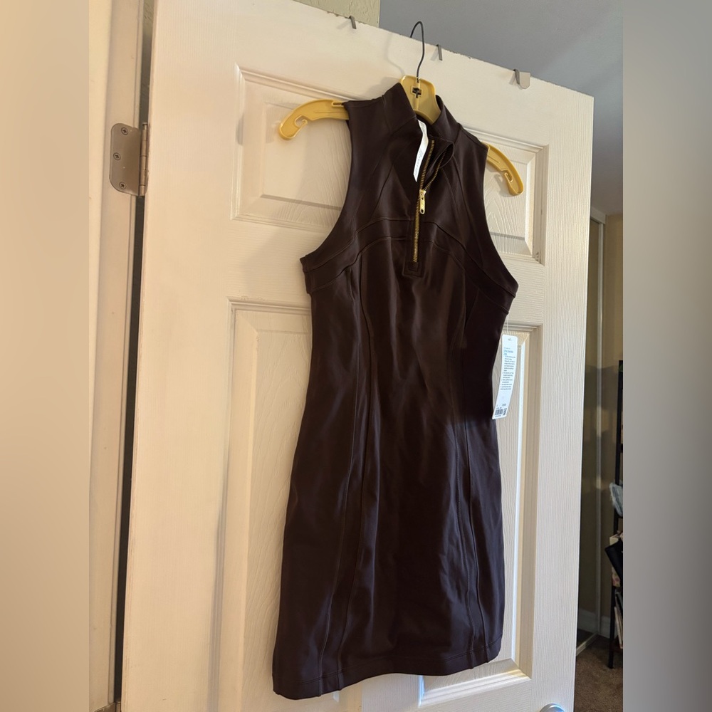Brown Define Sleeveless
Dress
The Define colllection